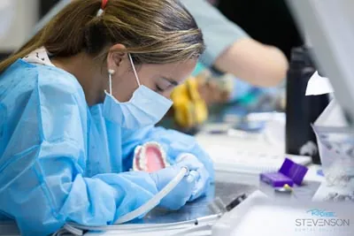 Study Club student practicing restoring a dental implant at Stevenson Dental Solutions Patient Care in San Dimas, CA